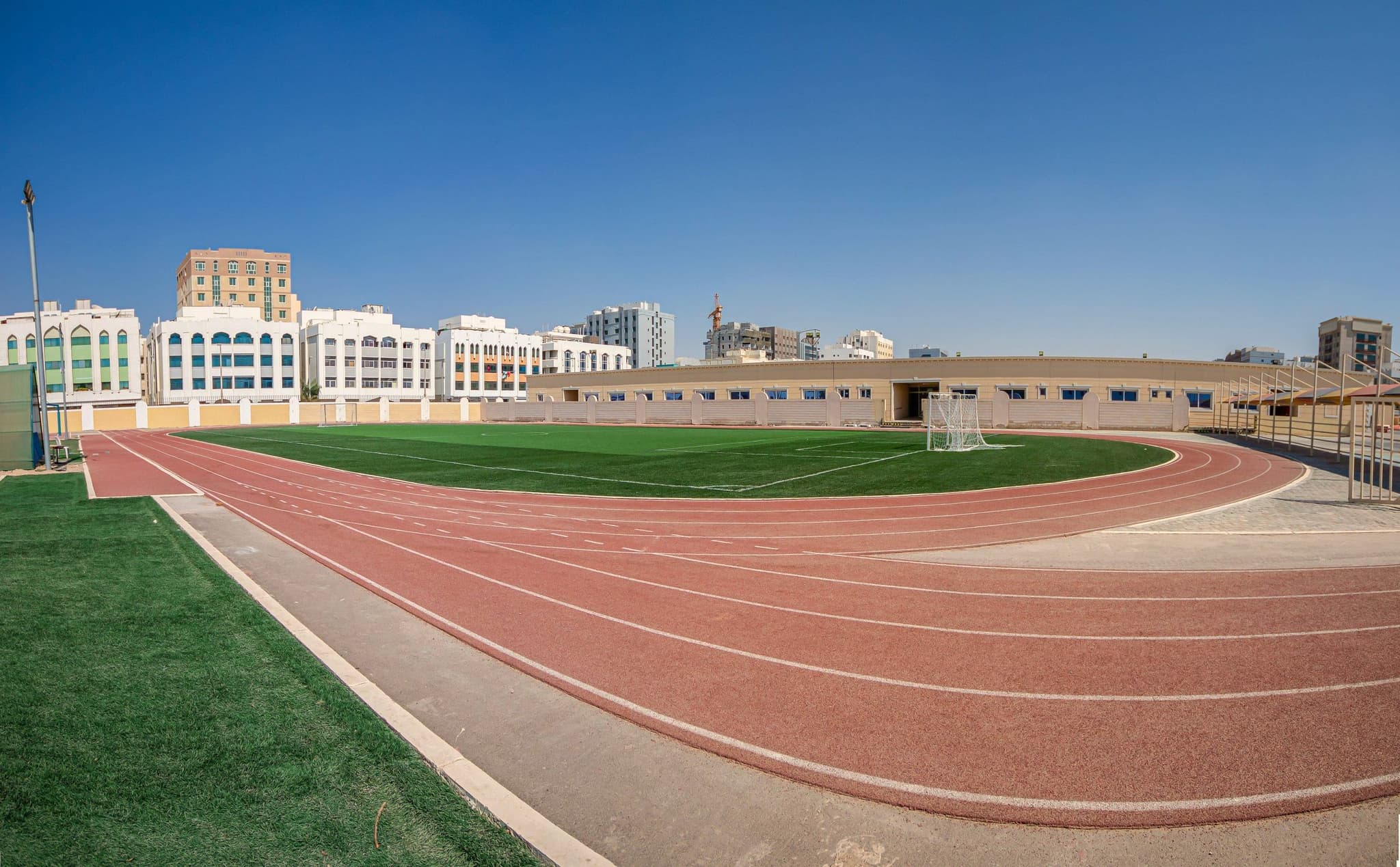 The astro-turf football pitch inside the red running track